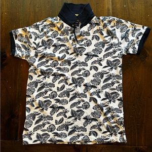 Men’s Denim and Flower polo shirt. Color blue and white. Size medium